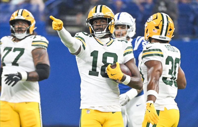 Aug 16, 2025; Indianapolis, Indiana, USA; Green Bay Packers wide receiver Malik Heath (18) celebrates after a first down during the first half against the Indianapolis Colts at Lucas Oil Stadium. Mandatory Credit: Robert Goddin-Imagn Images