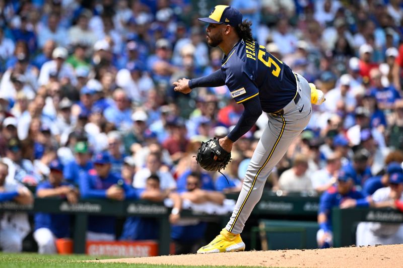 Milwaukee Brewers pitcher Freddy Peralta (51) delivers during the second inning against the Chicago Cubs at Wrigley Field on Aug. 18, 2025.