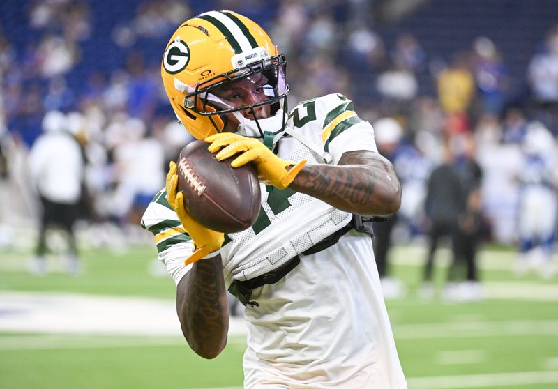 Aug 16, 2025; Indianapolis, Indiana, USA; Green Bay Packers wide receiver Matthew Golden (22) catches a pass during warmups prior to the game against the Indianapolis Colts at Lucas Oil Stadium. Mandatory Credit: Robert Goddin-Imagn Images