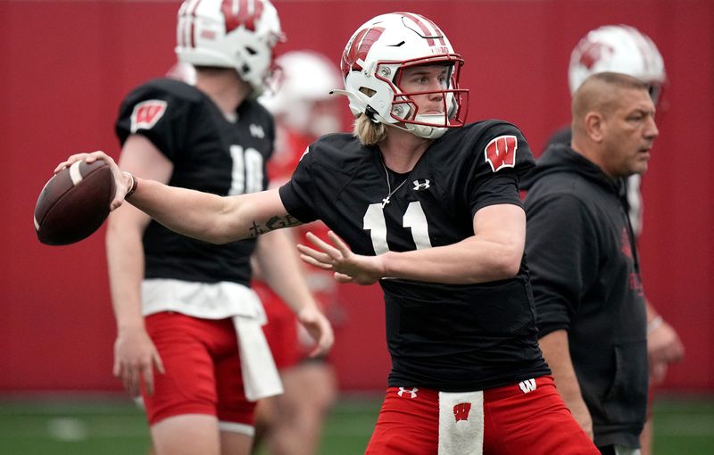 Wisconsin quarterback Mabrey Mettauer (11) is shown during spring football practice Thursday, April 25, 2024 in Madison, Wisconsin. The Wisconsin Badgers football team plays their season opener against Western Michigan on August 31.