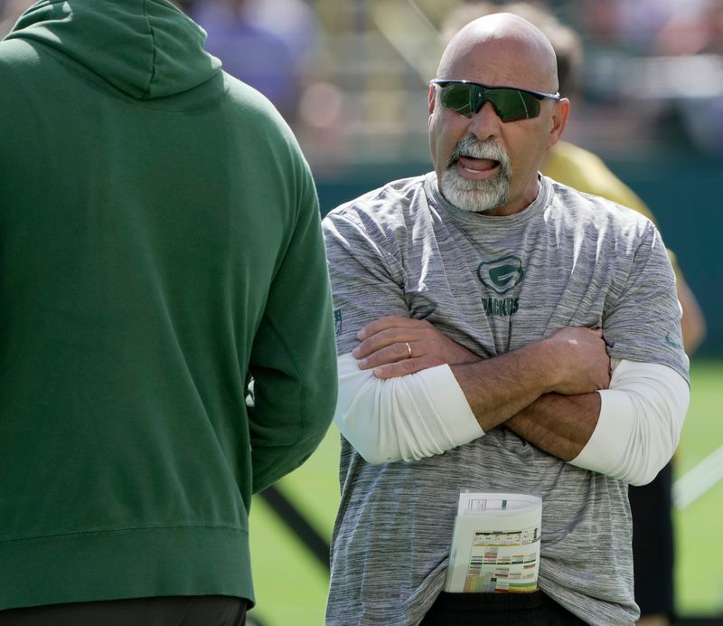 Green Bay Packers assistant head coach/special teams coordinator Rich Bisaccia watches a joint practice with Seattle.
