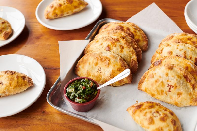 La Masa Empanada Bar serves scratch-made, Argentinian-style empanadas with traditional and creative fillings.
