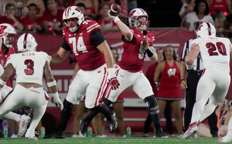 Wisconsin quarterback Billy Edwards Jr. (9) passes the ball during the first quarter of their game against Miami (Ohio) Thursday, August 28, 2025 at Camp Randall Stadium in Madison, Wisconsin.