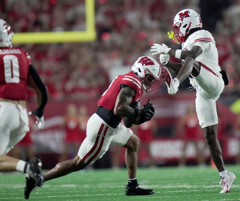 Wisconsin safety Austin Brown breaks up a pass intended Miami (Ohio) wide receiver Kam Perry during their game Aug. 28 at Camp Randall Stadium.