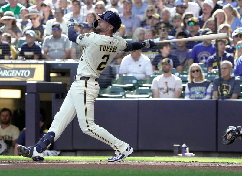 Milwaukee Brewers second base Brice Turang (2) hits a solo home run during the first inning of their game against the Philadelphia Phillies Monday, September 1, 2025 at American Family Field in Milwaukee, Wisconsin.