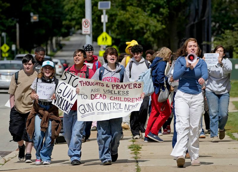 Wauwatosa East High School students march near their school Sept. 5, 2025, to protest gun violence. The march was part of Students Demand Action, a grassroots arm of Everytown for Gun Safety, to demand that lawmakers pass a ban on assault weapons and high-capacity magazines. The protest comes after the recent shooting at a Catholic school in Minneapolis.