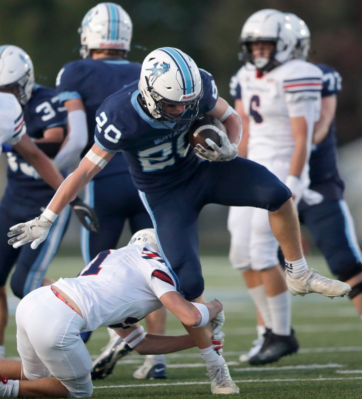 Reece Joten (20) and the Little Chute Mustangs play at Luxemburg-Casco on Thursday, Oct. 9, in a North Eastern Conference showdown.