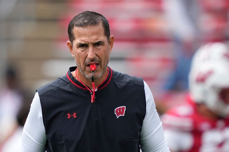 Sep 6, 2025; Madison, Wisconsin, USA; Wisconsin Badgers head coach Luke Fickell leads warm ups before a game against the Middle Tennessee Blue Raiders at Camp Randall Stadium. Mandatory Credit: Kayla Wolf-Imagn Images