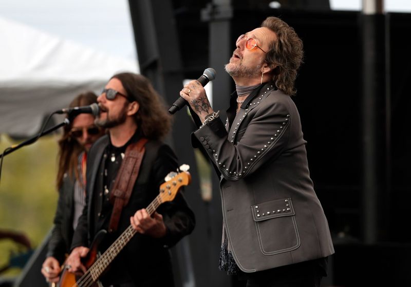 Lead singer Chris Robinson, right, performs with The Black Crowes for the Green Bay Packers' Weekend Kickoff concert on Sept. 6 outside Lambeau Field.