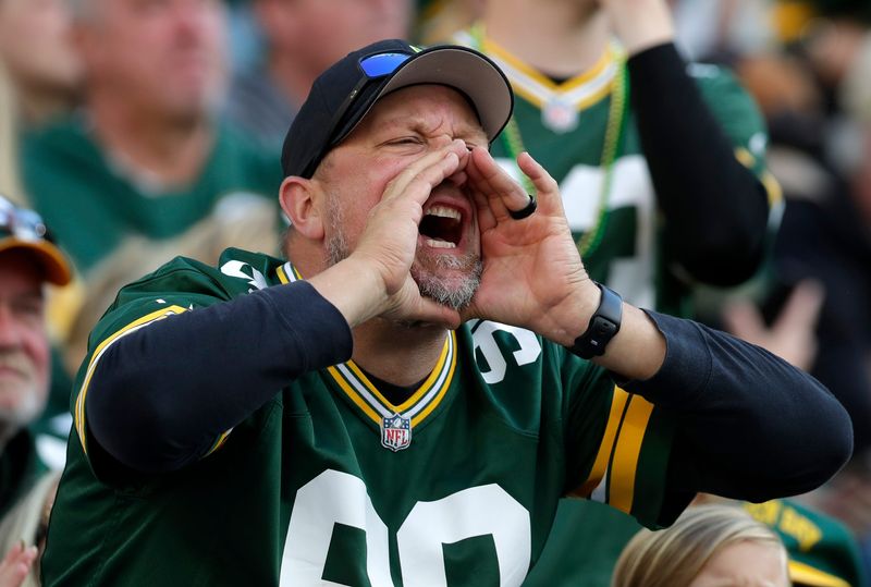 A Green Bay Packers fan yells during the season opener against the Detroit Lions on Sept. 7 at Lambeau Field in Green Bay. The Packers defeated the Lions 27-13.