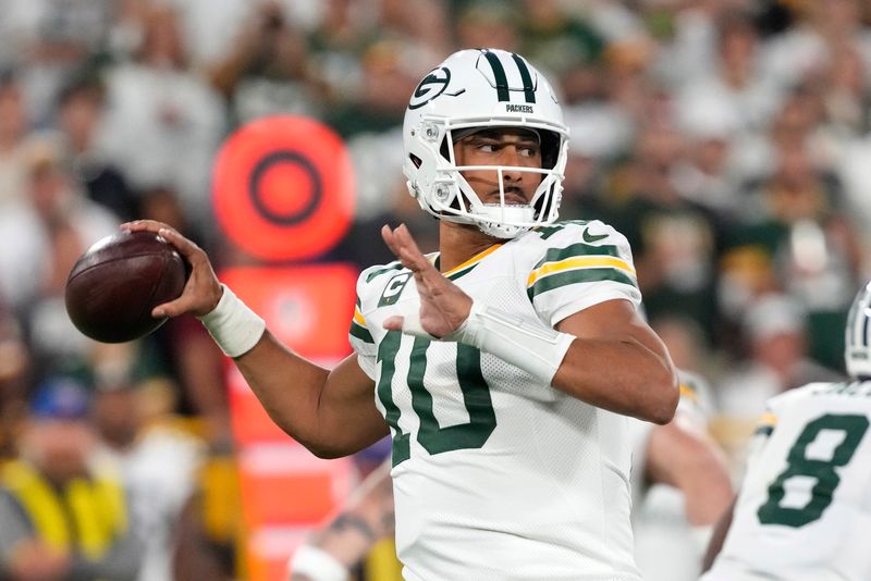 Sep 11, 2025; Green Bay, Wisconsin, USA; Green Bay Packers quarterback Jordan Love (10) passes against the Washington Commanders in the first quarter at Lambeau Field. Mandatory Credit: Jeff Hanisch-Imagn Images