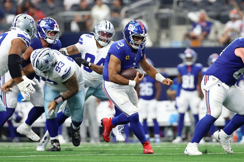 Sep 14, 2025; Arlington, Texas, USA; New York Giants quarterback Russell Wilson (3) runs with the ball against the Dallas Cowboys during the third quarter at AT&T Stadium. Mandatory Credit: Kevin Jairaj-Imagn Images