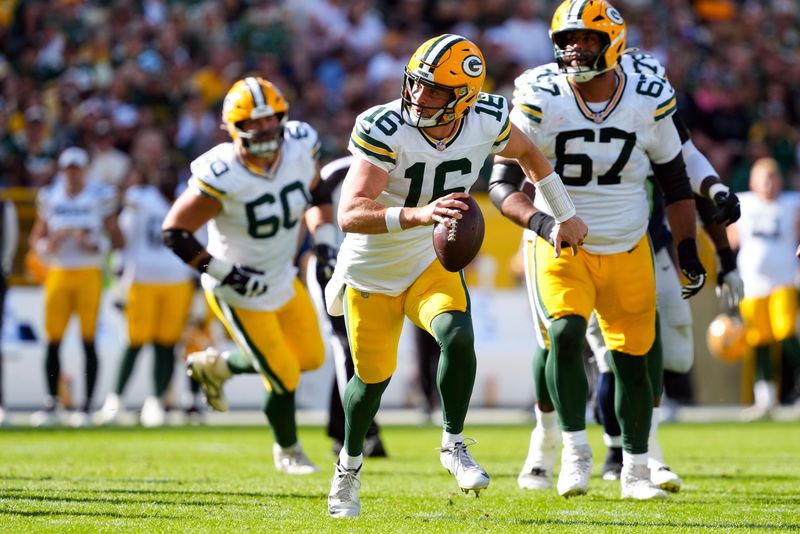 Aug 23, 2025; Green Bay, Wisconsin, USA; Green Bay Packers quarterback Sean Clifford (16) rushes with the football during the third quarter against the Seattle Seahawks at Lambeau Field. Mandatory Credit: Jeff Hanisch-Imagn Images