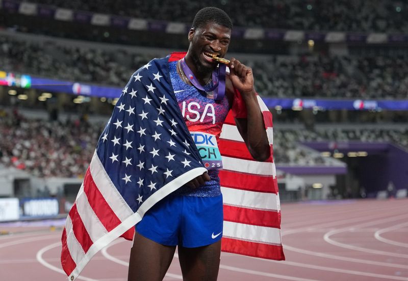 Cordell Tinch (USA) celebrates after winning the gold medal in the men’s 110 meter hurdles final during the World Athletics Championships at National Stadium on Sept. 16, 2025.