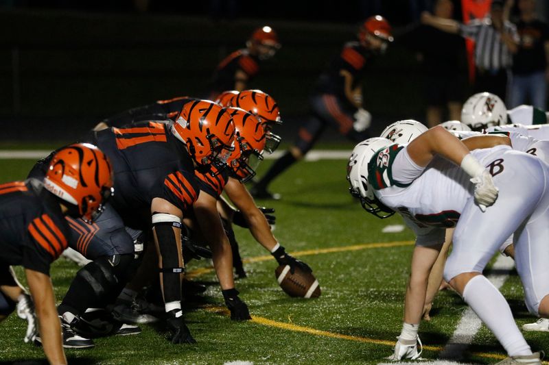 Ripon gets ready to hike the ball against Berlin at Ingalls Field in Ripon on Friday, Sept. 19, 2025. Berlin defeated Ripon 58-27.