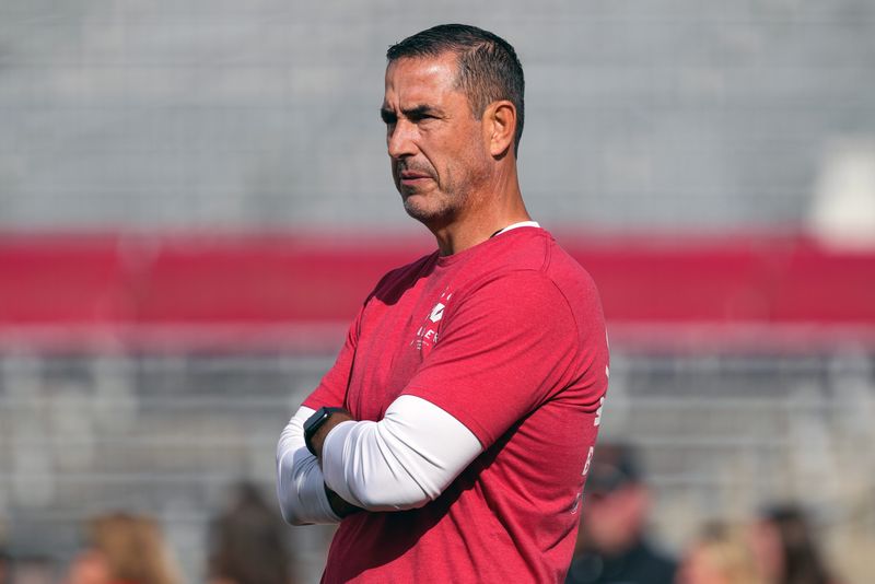 Sep 20, 2025; Madison, Wisconsin, USA; Wisconsin Badgers head coach Luke Fickell looks on during warm-ups prior to the game against the Maryland Terrapins at Camp Randall Stadium. Mandatory Credit: Jeff Hanisch-Imagn Images