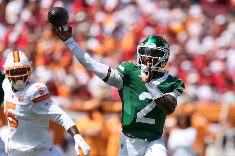 Sep 21, 2025; Tampa, Florida, USA; New York Jets quarterback Tyrod Taylor (2) throws a pass against the Tampa Bay Buccaneers in the first quarter at Raymond James Stadium. Mandatory Credit: Nathan Ray Seebeck-Imagn Images