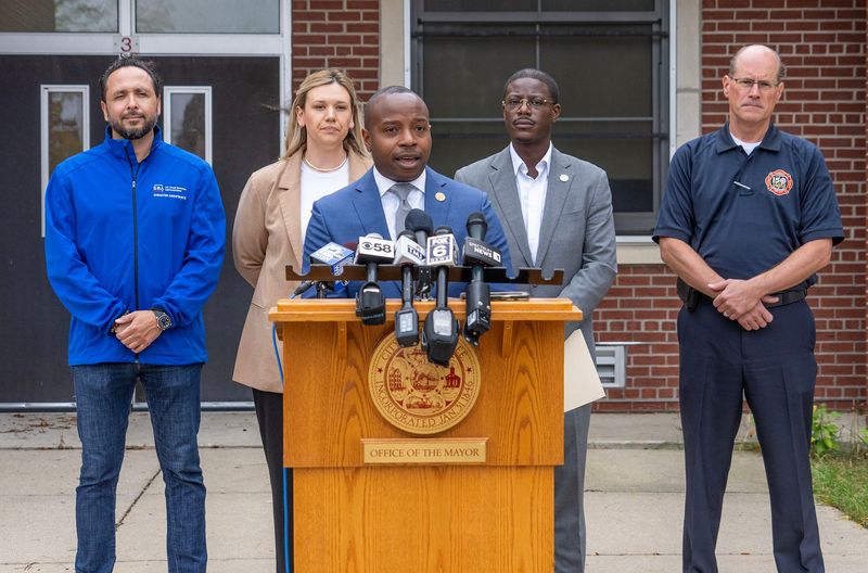 Milwaukee Mayor Cavalier Johnson speaks while (from left to right) Small Business Administration specialist Rick Corrales, Milwaukee Board of School Directors President Missy Zombor, Milwaukee County Executive David Crowley and Milwaukee Fire Chief Aaron Lipski listen as the location of the Disaster Recovery Center is announced atMcNair School on North 24th Street in Milwaukee, Wisconsin on Sept. 23, 2025. The center will open on Sept. 24