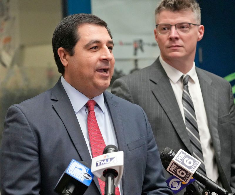 Wisconsin Attorney General, Josh Kaul, left and Rock County District Attorney, Jason Sanders, hold press conference at the state Crime Lab in Milwaukee on Tuesday, March 4, 2025.
