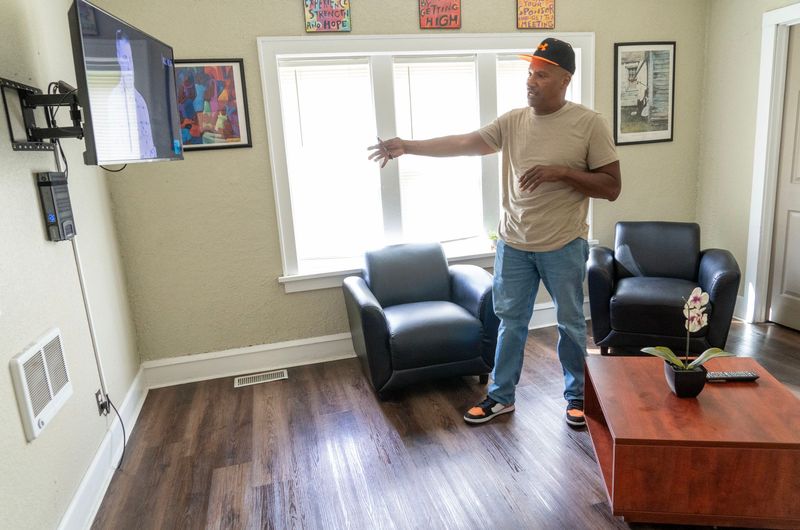Torre Johnson Sr. the program manager with and Sankofa and Nova House shows a community room at the Sankofa House on West Atkinson Avenue in Milwaukee, Wisconsin on Sept. 25, 2025. In recent years, Harambee residents have talked about an uptick in substance use disorders among older adults. It's not just a local trend, but a phenomenon with statewide implications.