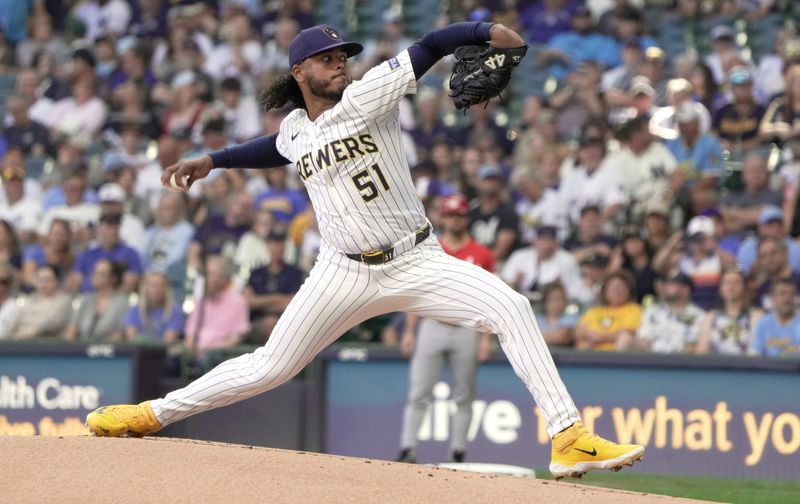 Milwaukee Brewers pitcher Freddy Peralta (51) throws during the first inning of their game against the Cincinnati Reds Sunday, September 28, 2025 at American Family Field in Milwaukee, Wisconsin.
