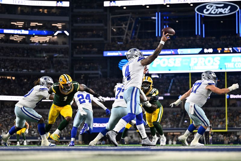 Sep 28, 2025; Arlington, Texas, USA; Dallas Cowboys quarterback Dak Prescott (4) passes against the Green Bay Packers in the first half at AT&T Stadium. Mandatory Credit: Jerome Miron-Imagn Images
