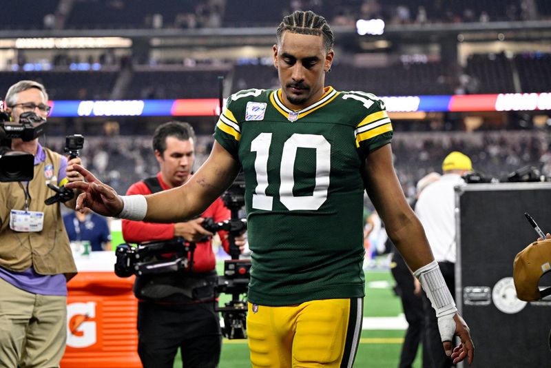 Sep 28, 2025; Arlington, Texas, USA; Green Bay Packers quarterback Jordan Love (10) leaves the field after the game ended in a tie at AT&T Stadium. Mandatory Credit: Jerome Miron-Imagn Images