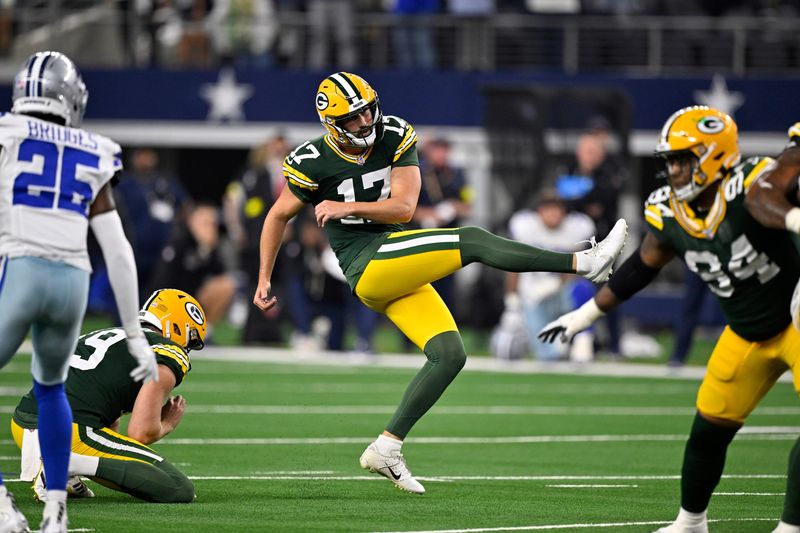 Sep 28, 2025; Arlington, Texas, USA; Green Bay Packers place kicker Brandon McManus (17) kicks a field goal against the Dallas Cowboys to send the game into over time at AT&T Stadium.