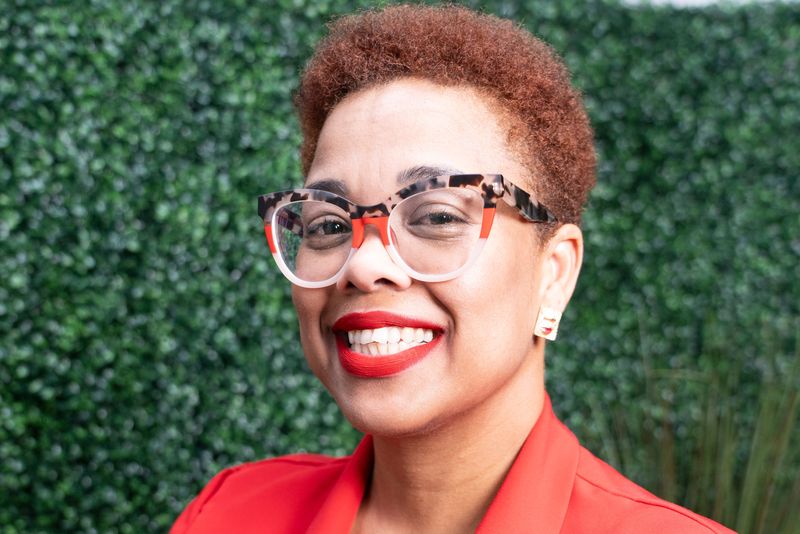 Mariel Mercedes, founder of Best of MKE Podcast, poses for a portrait in the podcast studio on Sept. 29, 2025, in Milwaukee, Wisconsin. Mercedes advocates for suicide prevention and invites speakers on her show to discuss mental health wellness in the Latino community. -Angelica Edwards/ The Milwaukee Journal Sentinel