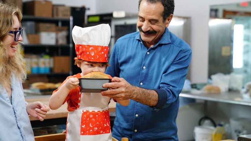 Actor and Green Bay native Tony Shalhoub visited Fika Bakery & Coffee House in Egg Harbor with his daughter, Josie Adams, and grandson, Tucker, to learn about Swedish limpa bread for his 2025 food and travel series, "Tony Shalhoub Breaking Bread," on CNN.