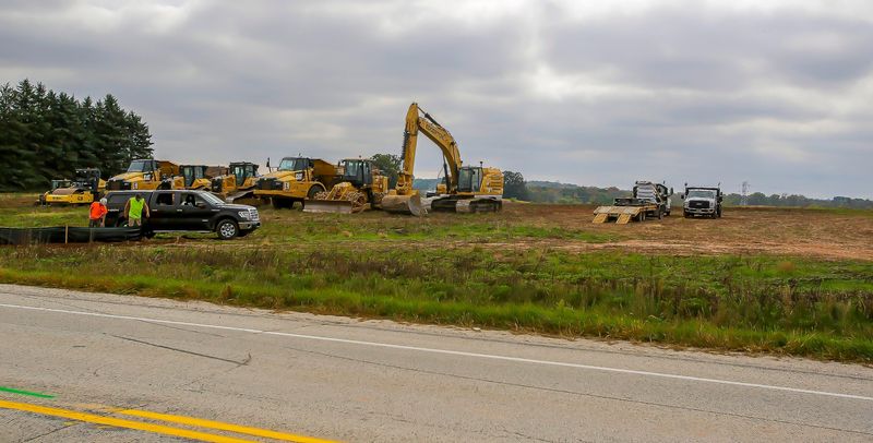 Construction equipment lines up near state Highway 57 and county Road PP to dig in and work on creating the newest facility for Sargento Foods in Plymouth, Wis.
