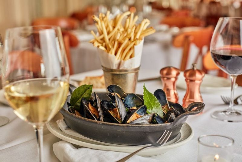 One of Lake Park Bistro's most popular dishes is its Moules Marinières, East Coast mussels steamed in white wine-cream broth, garlic, herbs, shallots, and served with bistro frites.