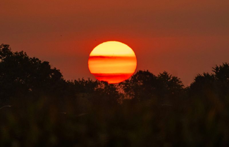 The sun rises in Oak Creek, Wisconsin on Oct. 3, 2025.
