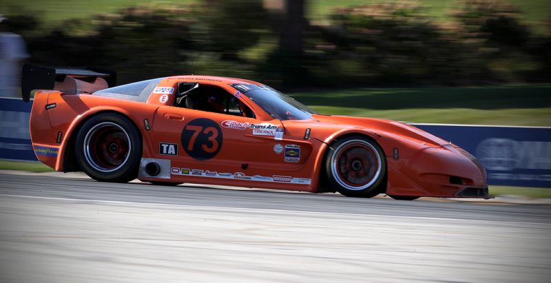 Dominic Martinolich (73) speeds of of turn 5 in his 1998 Chevrolet Corvette during the SCCA Runoffs at Elkhart Lake’s Road America, Saturday, October 4, 2025, at Elkhart Lake, Wis.