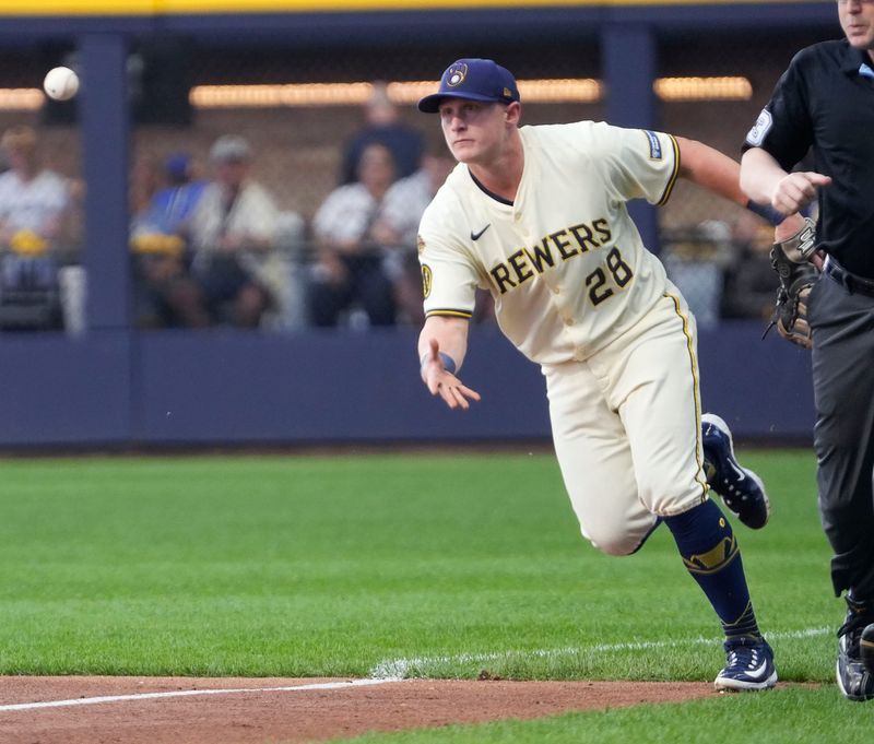 Chicago Cubs right fielder Kyle Tucker (30) grounds out to Milwaukee Brewers first baseman Andrew Vaughn (28) during the first inning of their National League Division Series game on Saturday October 4, 2025 at American Family Field in Milwaukee, Wisconsin. 

Jovanny Hernandez / Milwaukee Journal Sentinel
