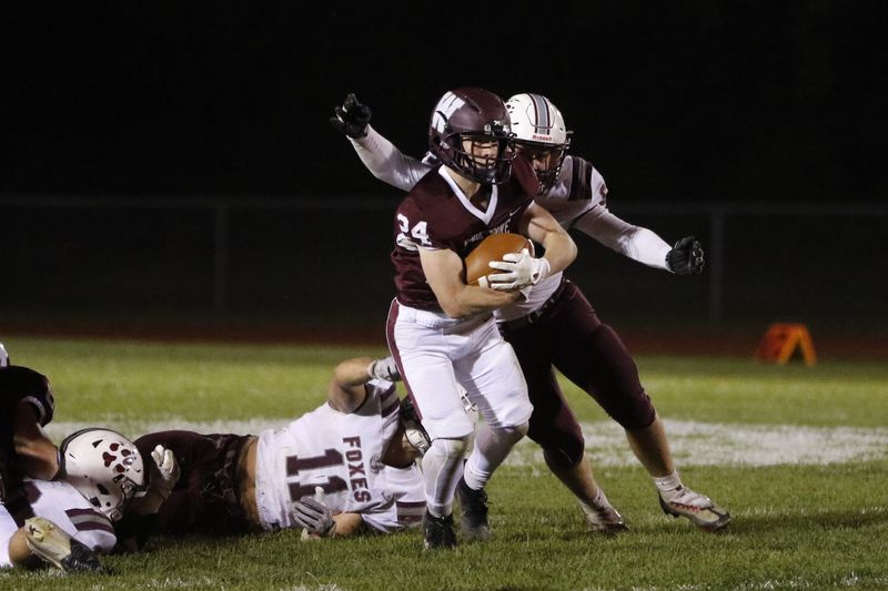 Winneconne's Mason Mathe on a rushing attempt against Fox Valley Lutheran at Winneconne High School on Thursday, Oct. 9, 2025. Winneconne won the game 38-31.