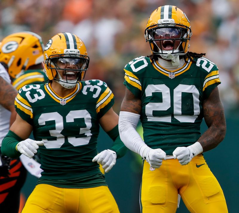 Green Bay Packers safeties Evan Williams (33) and Javon Bullard (20) celebrate after Bullard tackles Cincinnati Bengals wide receiver Ja'Marr Chase for a loss on Sunday, October 12, 2025, at Lambeau Field in Green Bay, Wis. The Packers won the game, 27-18.
Tork Mason/USA TODAY NETWORK-Wisconsin