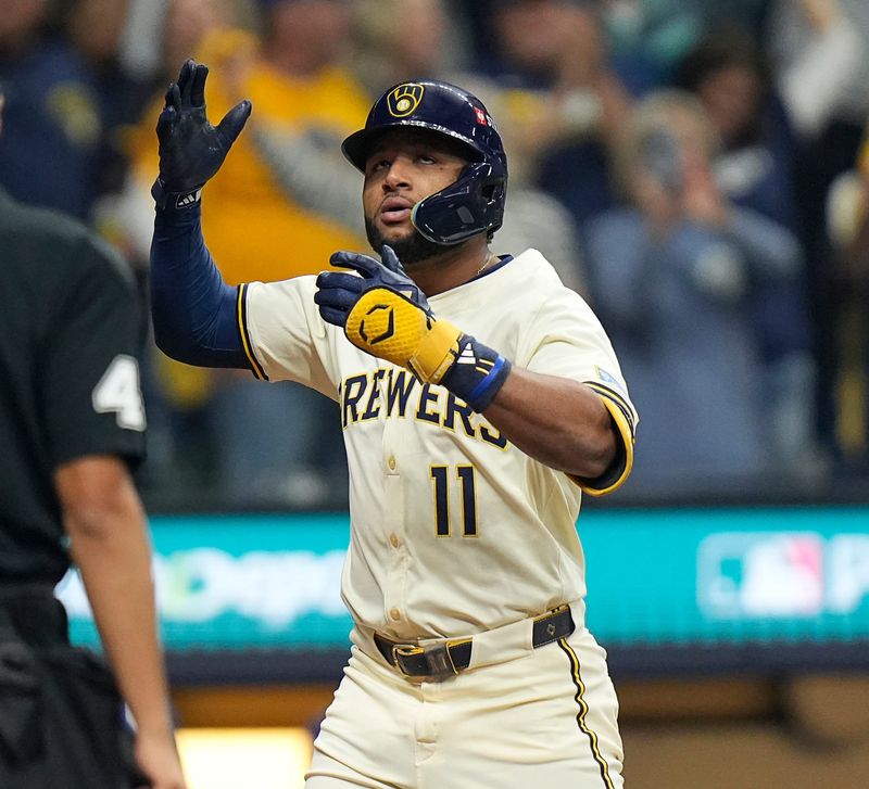 Milwaukee Brewers center fielder Jackson Chourio homers on a fly ball to right center field during the first inning of the National League Championship Series game October 14, 2025 at American Family Field in Milwaukee, Wisconsin.