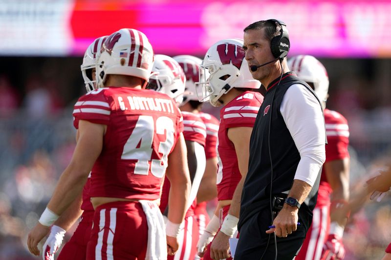 Oct 18, 2025; Madison, Wisconsin, USA; Wisconsin Badgers head coach Luke Fickell looks on in the first quarter against the Ohio State Buckeyes at Camp Randall Stadium. Mandatory Credit: Jeff Hanisch-Imagn Images