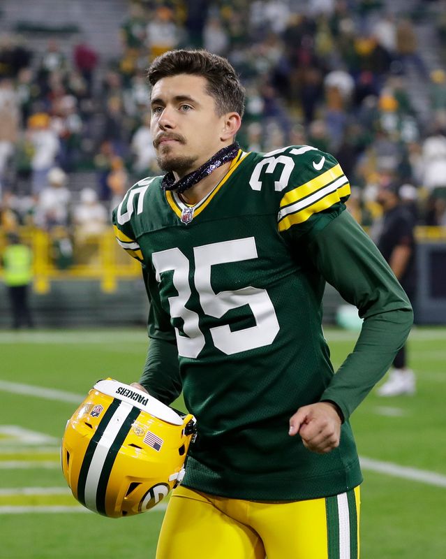 Green Bay Packers kicker Lucas Havrisik (35) runs off the field after a game against the Cincinnati Bengals on Oct. 12, 2025, at Lambeau Field in Green Bay, Wis. The Packers defeated the Bengals 27-18.