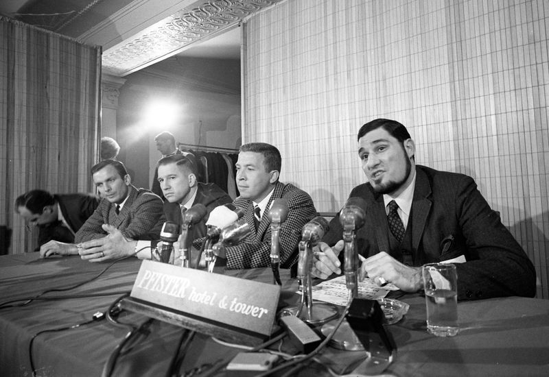 Wesley Pavalon (right), president of the new Milwaukee Bucks, introduced the key men in the club's operation at a press conference at the Pfister Hotel on April 4, 1968. From left were administrative assistantTom Nissalke, coach Larry Costello and general manager John Erickson.