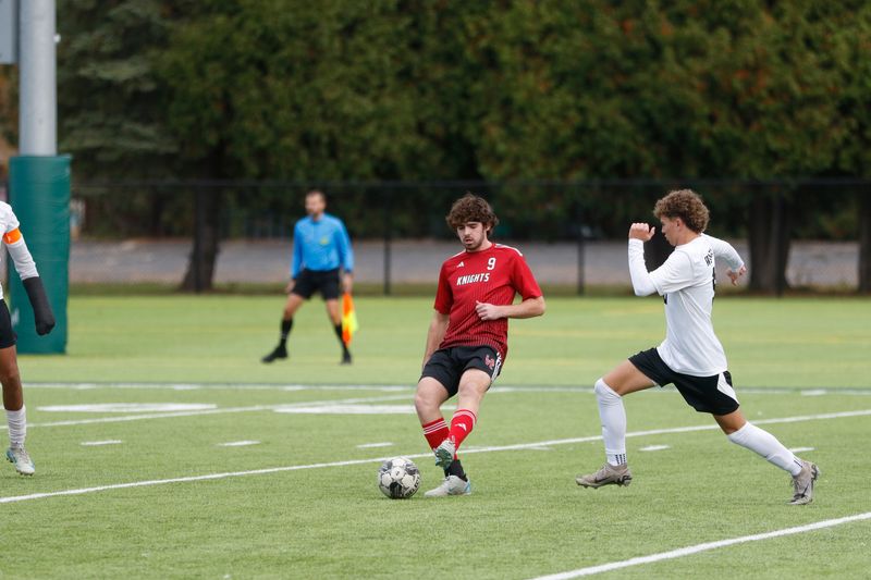Lourdes Academy/Valley Christian's Jackson Buttke makes a pass against Algoma at Oshkosh North on Saturday, Oct. 25, 2025. Lourdes Academy/Valley Christian won 2-0.