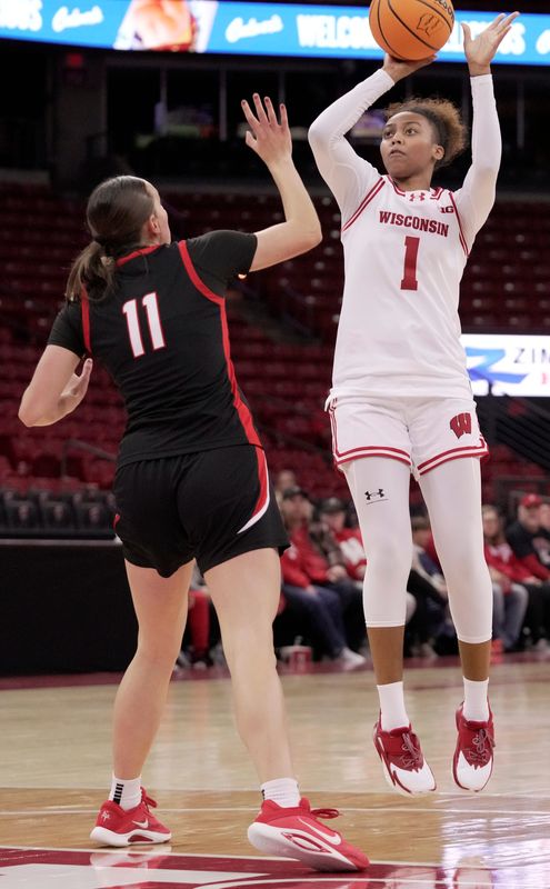 Wisconsin guard Destiny Howell (1) shoots over UW-River Falls forward Emily Anderson (11) during the second half of their exhibition game Monday, October 27, 2025 at the Kohl Center in Madison, Wisconsin.