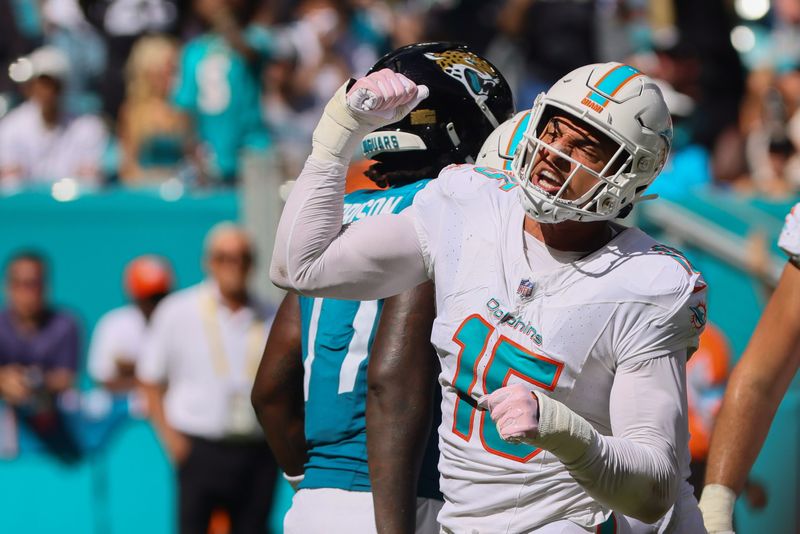 Sep 8, 2024; Miami Gardens, Florida, USA; Miami Dolphins linebacker Jaelan Phillips (15) celebrates after sacking Jacksonville Jaguars quarterback Trevor Lawrence (not pictured) during the fourth quarter at Hard Rock Stadium.