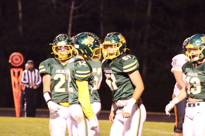 Edgar seniors Dom Contreras and Preston Erickson celebrate a stop at Edgar High School on Friday, Oct. 31, 2025. No. 1 Edgar beat No. 4 Poynette 42-0 in a WIAA Level 2 playoff game (Alfred Smith III/Wausau Daily Herald.)