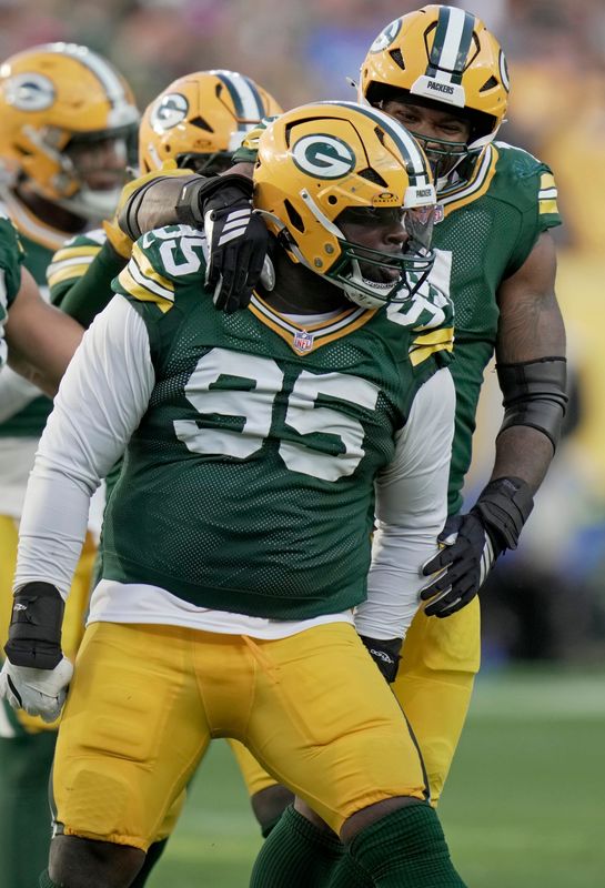 Green Bay Packers defensive tackle Devonte Wyatt (95) celebrates his sack of Detroit Lions quarterback Jared Goff during the fourth quarter of their game Sunday, September 7, 2025 at Lambeau Field in Green Bay, Wisconsin. The Green Bay Packers beat the Detroit Lions 27-13.