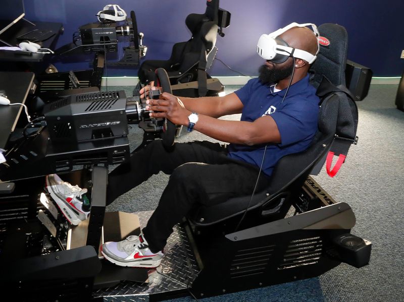 Olufemi Tomori, owner of PowerPlay Arena, demonstrates one of the virtual reality areas at the soon to open firm at 2927 N. 15th St., Friday, Nov. 7, 2025, in Sheboygan, Wis.