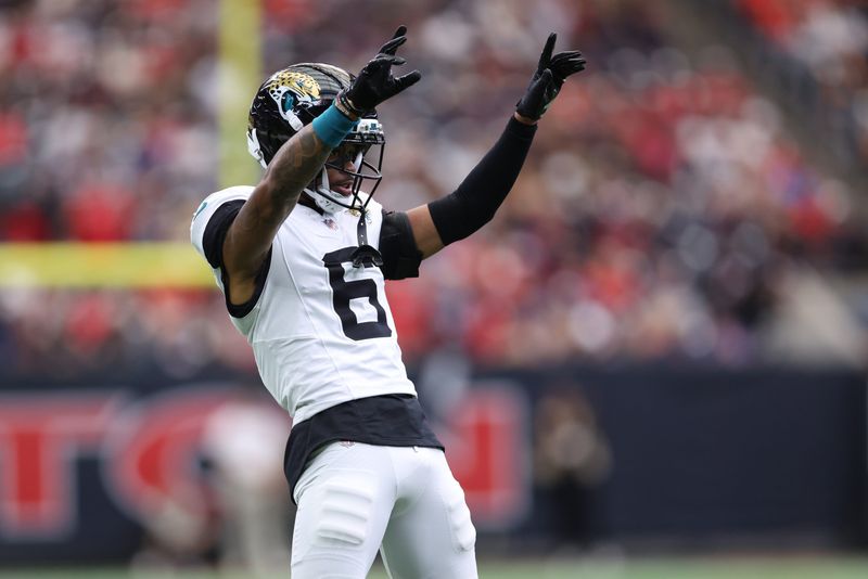 Nov 9, 2025; Houston, Texas, USA; Jacksonville Jaguars cornerback Greg Newsome II (6) reacts after a defensive play against the Houston Texans during the second half at NRG Stadium. Mandatory Credit: Troy Taormina-Imagn Images