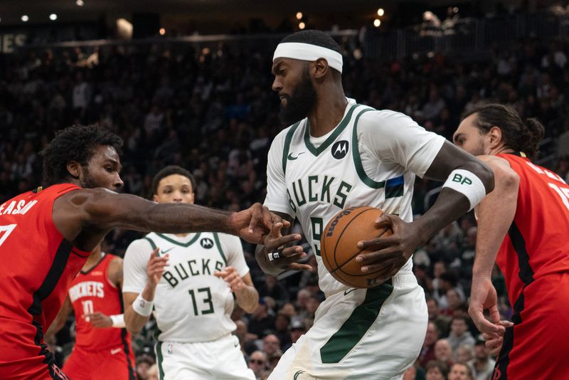 Milwaukee Bucks forward Bobby Portis (9) recovers the ball from the Houston Rockets in the second half of their game at Fiserv Forum in Milwaukee, Wisconsin, on the afternoon of Nov. 9, 2025. The Bucks lost to the Rockets 122-115.