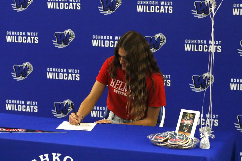 Oshkosh West's Sydnee Nelson signs her national letter of intent to play volleyball at Belmont University on Wednesday, Nov. 12.